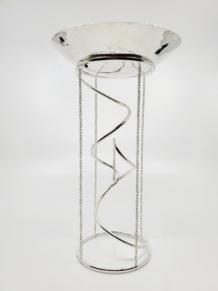 Tensegrity - A kinetic, collapsible, sculpture of sterling silver, with sapphires. 