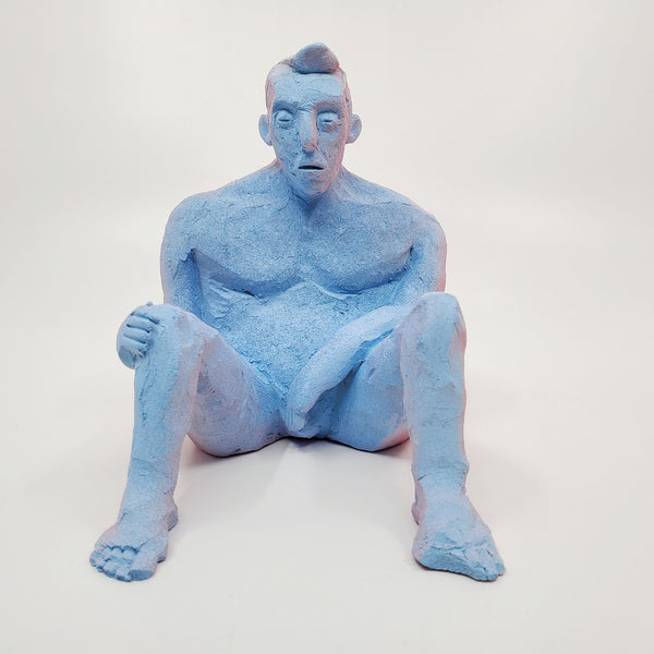 Kiss Me Baby II- small double-sided pink and blue ceramic sculpture painted with gouache. The sculpture is comprised of two sides, one of a figure and the other of a face. 