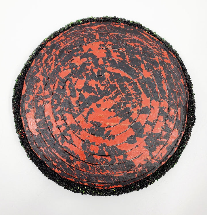 Red & Black: Mixed media wall sculpture constructed with a corrugated cardboard base. It is painted with acrylics, and adorned with glass beads.