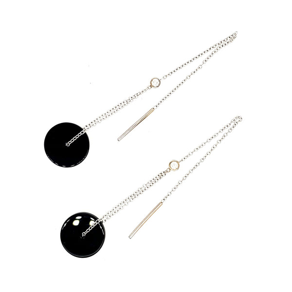 Dangle earrings with 18k white gold chain, onyx pendants, and diamond accents. 