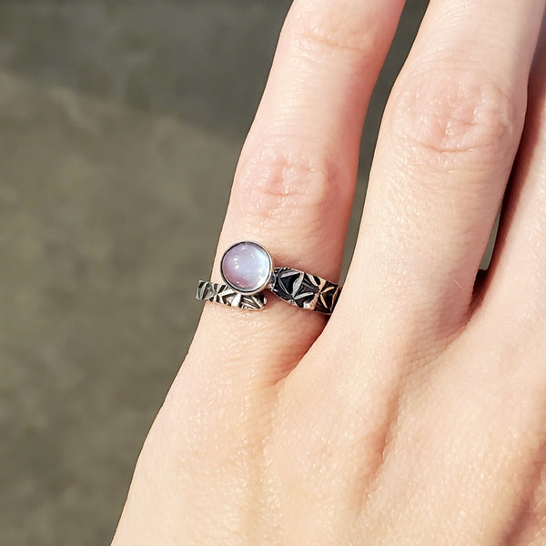 Hand stamped sterling silver ring with a moonstone. 