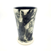 Medium ceramic vessel - 3. Hand painted porcelain vessel. Black glaze has been applied in careful layers to depict faces and patterns. 10 x 10 x 18 cm.