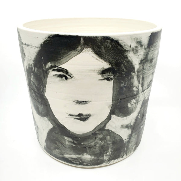 Large ceramic vessel - 2. Hand painted porcelain vessel. Black glaze has been applied in careful layers to depict faces and patterns. 25 x 25 x 23 cm.