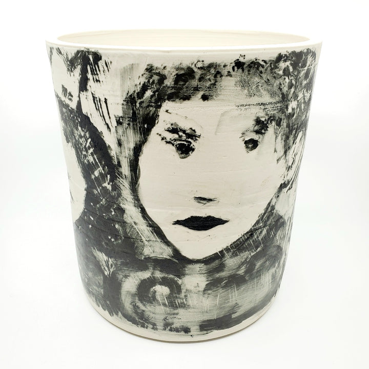 Large ceramic vessel - 1. Hand painted porcelain vessel. Black glaze has been applied in careful layers to depict faces and patterns. 23 x 23 x 25 cm.