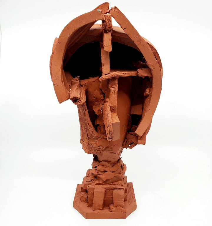 Terra Cotta Small Heads series - 1. Ceramic sculpture of multiple layers of red clay. This bust measures 18 x 14 x 35 cm.