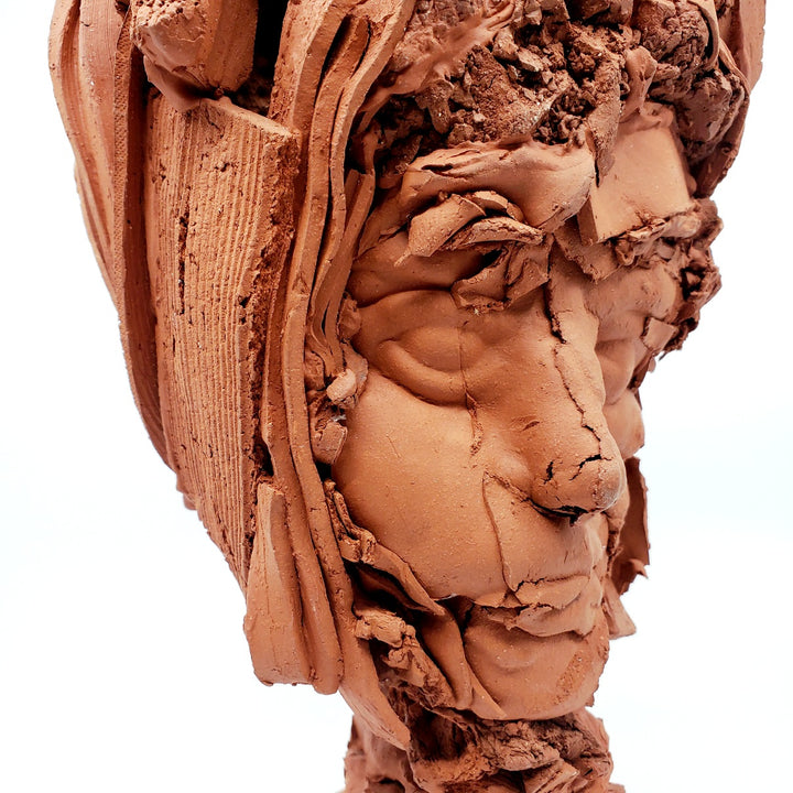 Terra Cotta Small Heads series - 1. Ceramic sculpture of multiple layers of red clay. This bust measures 18 x 14 x 35 cm.