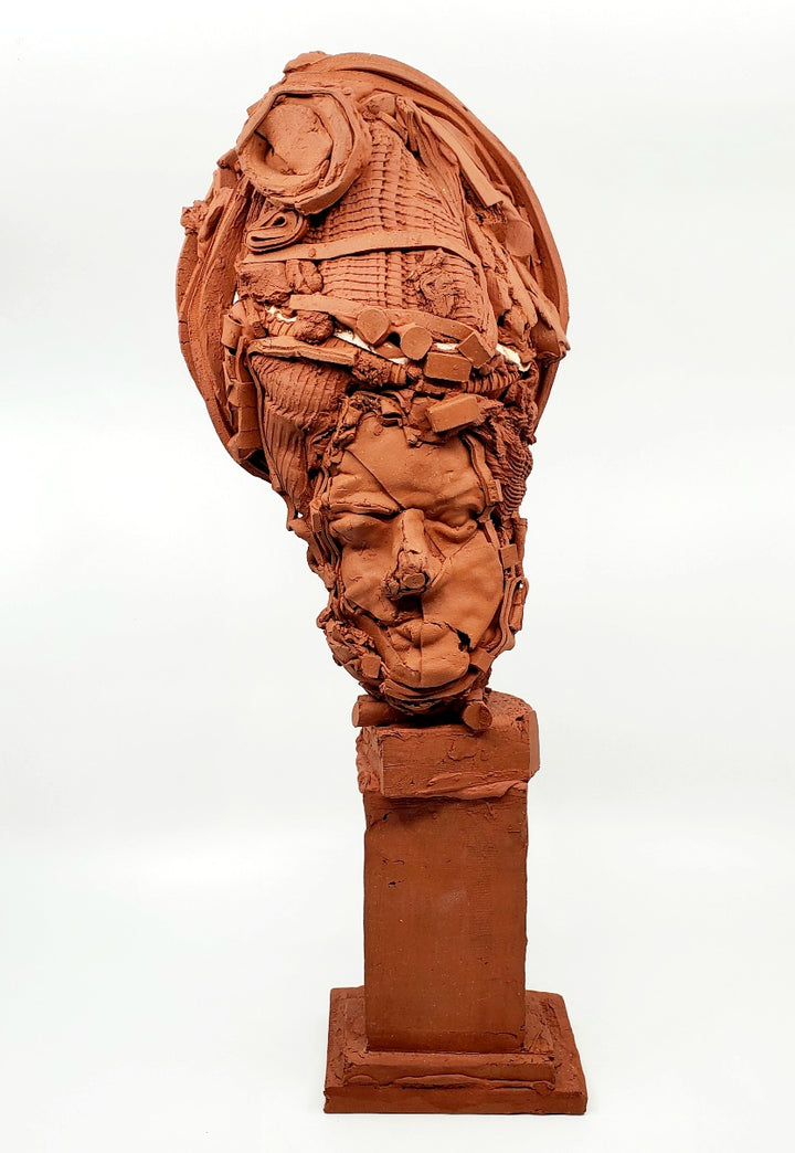 Terra Cotta Small Heads series - 3. Ceramic bust sculpture created by building up layers and layers of red clay. This bust measures 21 x 17 x 49 cm.