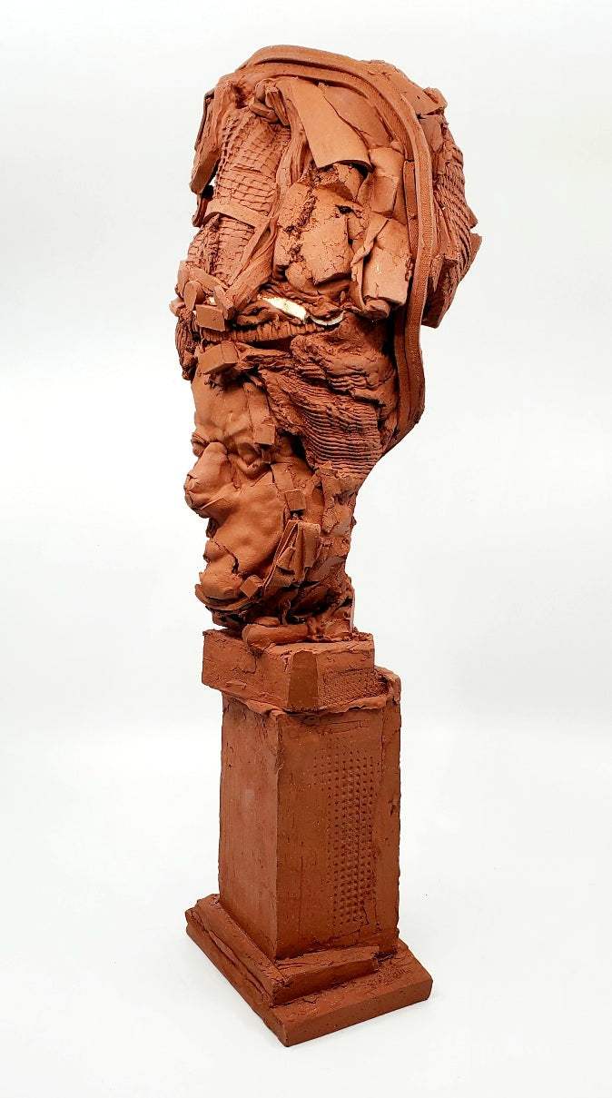 Terra Cotta Small Heads series - 3. Ceramic bust sculpture created by building up layers and layers of red clay. This bust measures 21 x 17 x 49 cm.
