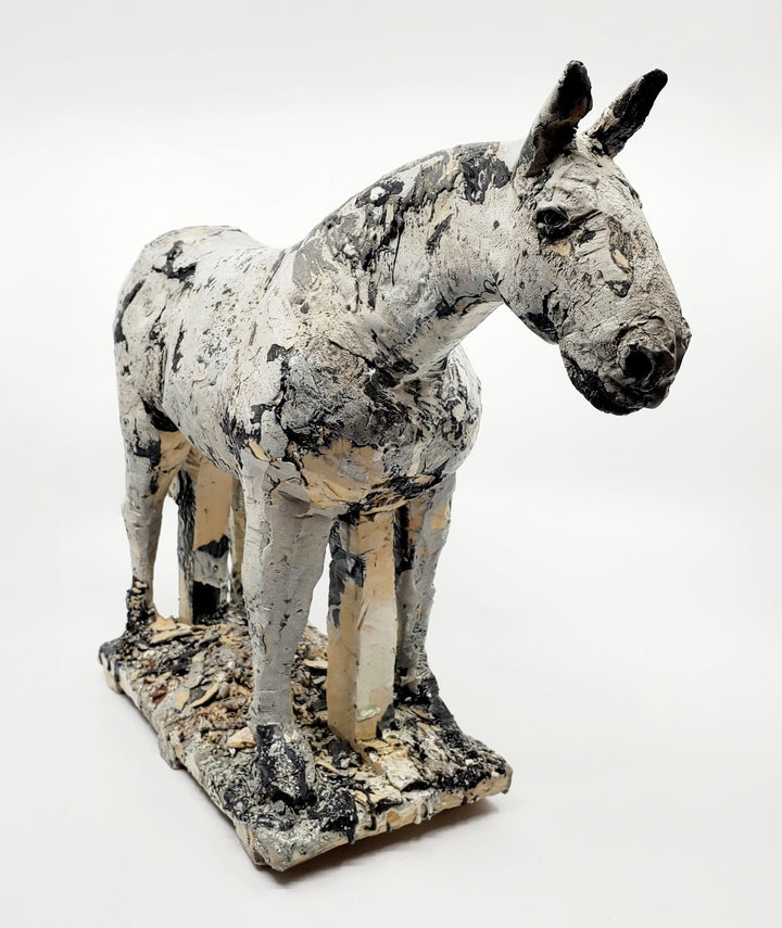 Small Gray Horse 1. This ceramic sculpture with its beautiful dappled texture  achieved with layers of coloured engobes and glazes measures 40 x 10 x 30 cm.