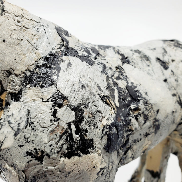 Small Gray Horse 1. This ceramic sculpture with its beautiful dappled texture  achieved with layers of coloured engobes and glazes measures 40 x 10 x 30 cm.