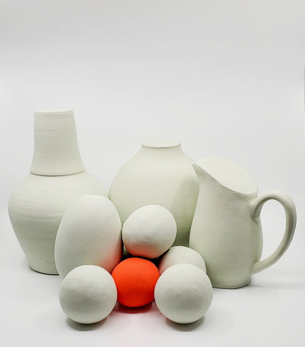 Quiet Places - Grouping of hand molded clay coloured pieces which can be arranged in multiple ways. This composite sculpture includes 10 pieces. 