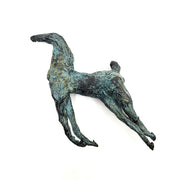 Moment, 2012. Unique cast bronze sculpture (1/1 edition) of a horse. This small-scale piece is finished with a green patina and has a metal loop on the back so that it  or suspended on the wall or it may be worn as a neckpiece.
