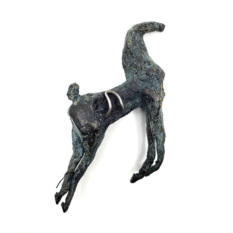 Moment, 2012. Unique cast bronze sculpture (1/1 edition) of a horse. This small-scale piece is finished with a green patina and has a metal loop on the back so that it  or suspended on the wall or it may be worn as a neckpiece.