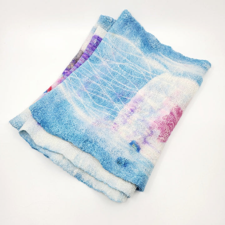 Long and delicate cowl in a childlike animals and letters design, created with hand-dyed silk and merino wool with recycled materials. Very soft to wear.