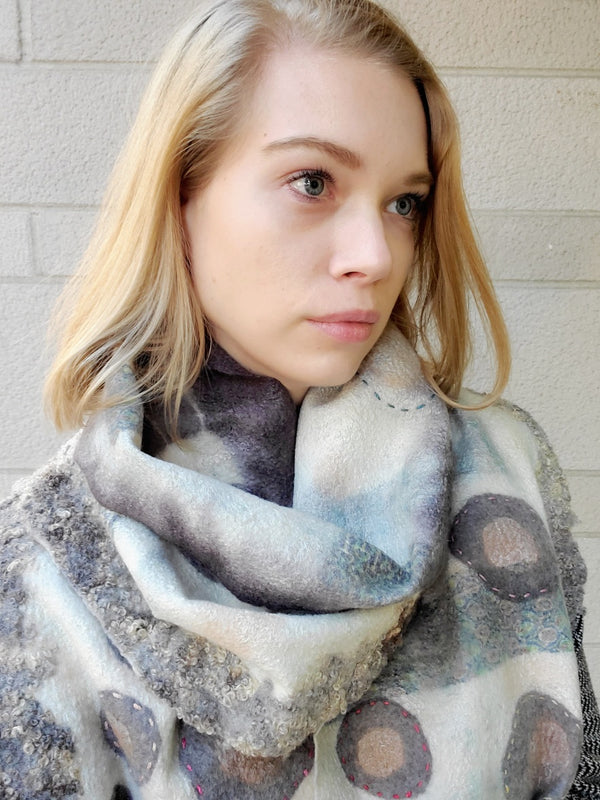 Beige scarf in a long dot pattern with a wool trim, created with hand-dyed silk and locally farmed wool. 