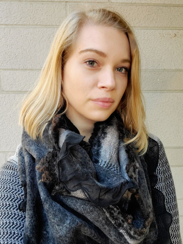 Black infinity scarf, created with hand-dyed silk and merino wool with recycled materials. 