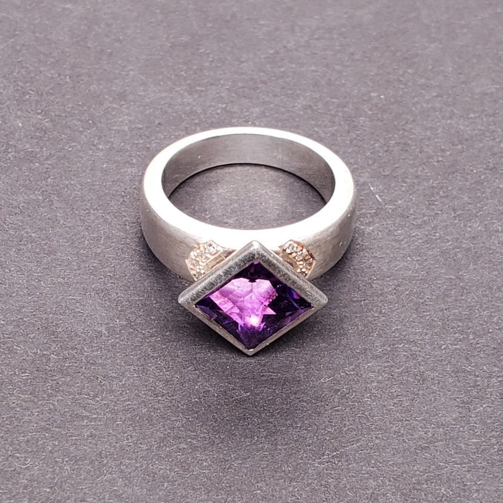 Moderna Square ring with a radiant modern fancy cut square 8mm amethyst. 