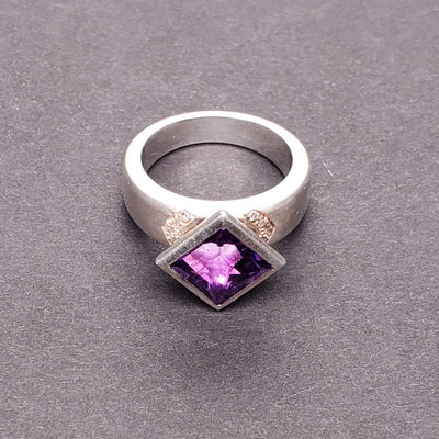 Moderna Square ring with a radiant modern fancy cut square 8mm amethyst. 