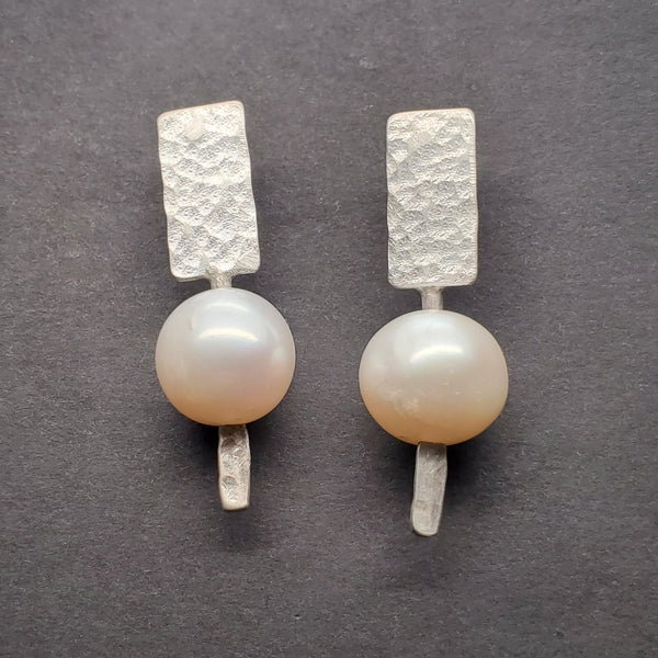 Freshwater pearl drop studs with hand formed fine and sterling silver. 