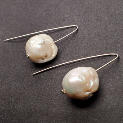 Large baroque pearl dangle from sterling silver hooks. 