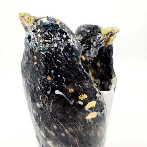 Vase - Starlings : multi-fired porcelain vase with two bird heads reaching skyward, flecked with gold lustre.