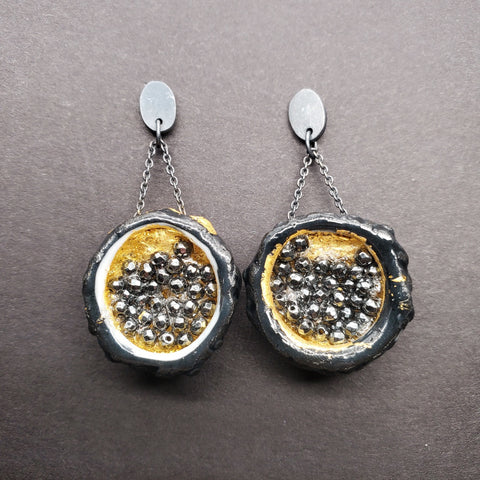 Cynorrhodon, earrings in silver, porcelain and hematite. Black and silver.