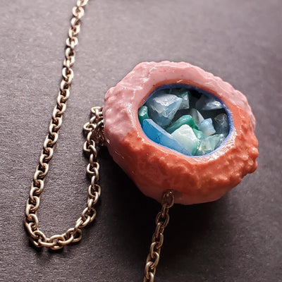 Porcelain and silver necklace.