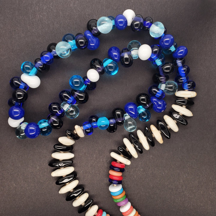 Morning Dewdrops necklace made from flame-worked multicoloured glass beads on a 21" chain with sterling silver clasp.