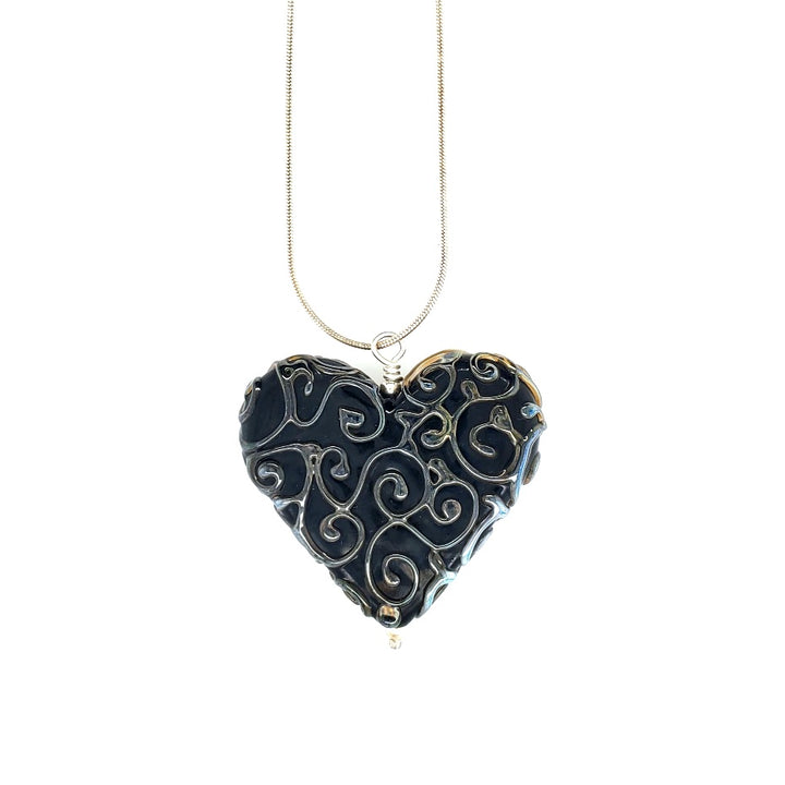 Gingerbread Heart glass pendant in black on a 18" sterling silver snake chain.