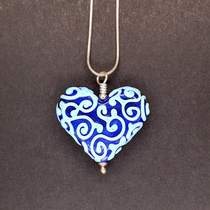 Gingerbread Heart glass pendant in blue on a 18" sterling silver snake chain.