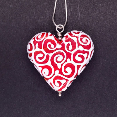 Gingerbread Heart glass pendant in red on a 16" sterling silver snake chain.