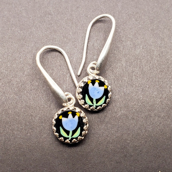  Botanical drop earrings in sterling silver featuring a blue tulip design.