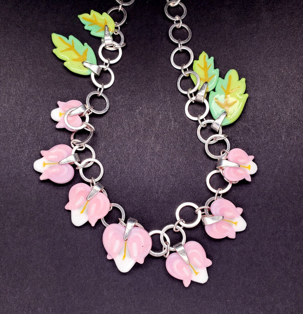 Bleeding Heart necklace made from glass murrine cane on a 20" sterling silver link chain.