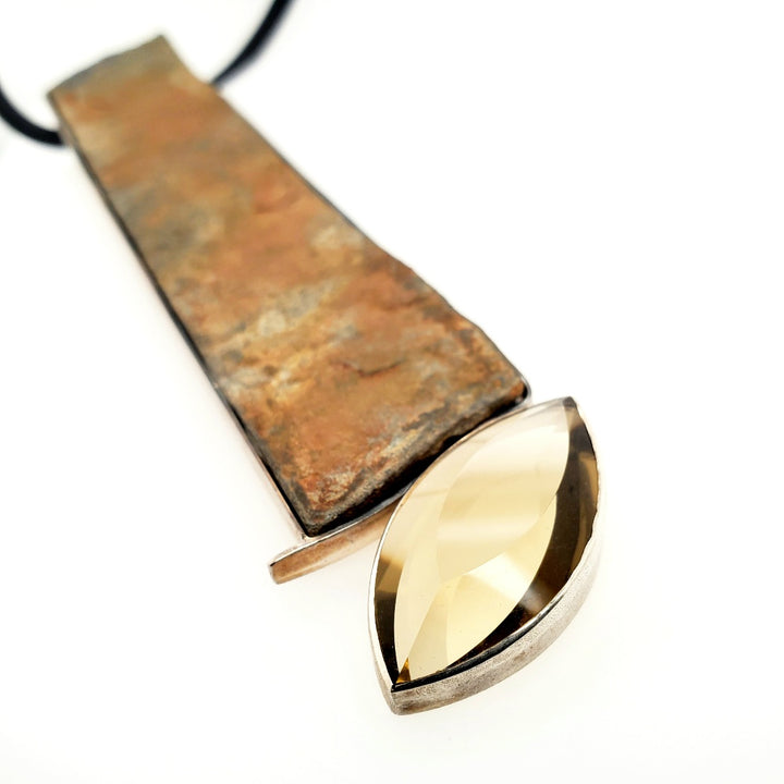 Large pendant with a marquise cut citrine and long slab of slate set in sterling silver (14 x 3 cm) on a 40 cm long rubber coil.