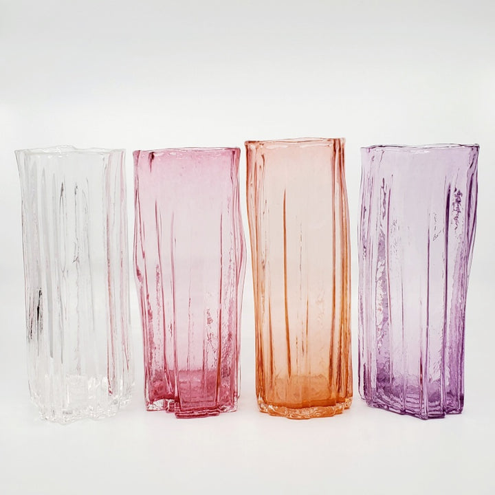 Xylem large vases are available in a variety of rich and vibrant colours. These hand blown glass vessels will liven up home or office and make wonderful sets. - Clear, Pink, Salmon, Amethyst