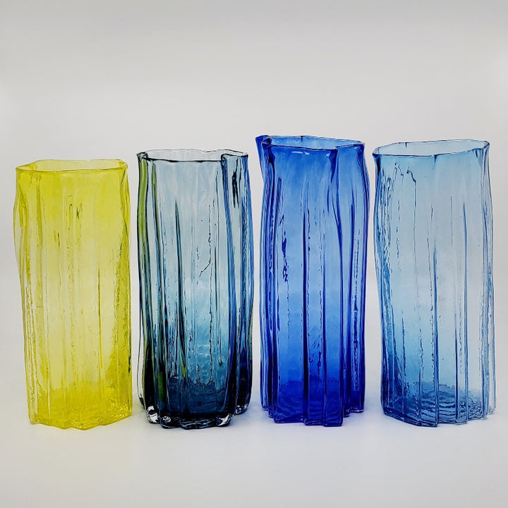 Xylem large vases are available in a variety of rich and vibrant colours. These hand blown glass vessels will liven up home or office and make wonderful sets. - Yellow, Dark teal, Cobalt, Aqua