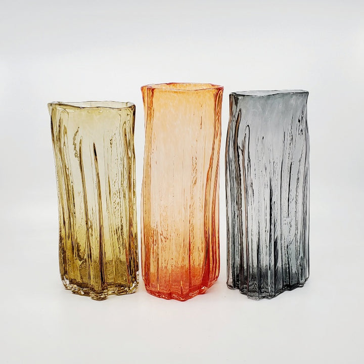 Xylem large vases are available in a variety of rich and vibrant colours. These hand blown glass vessels will liven up home or office and make wonderful sets. - Cognac, Red, Black