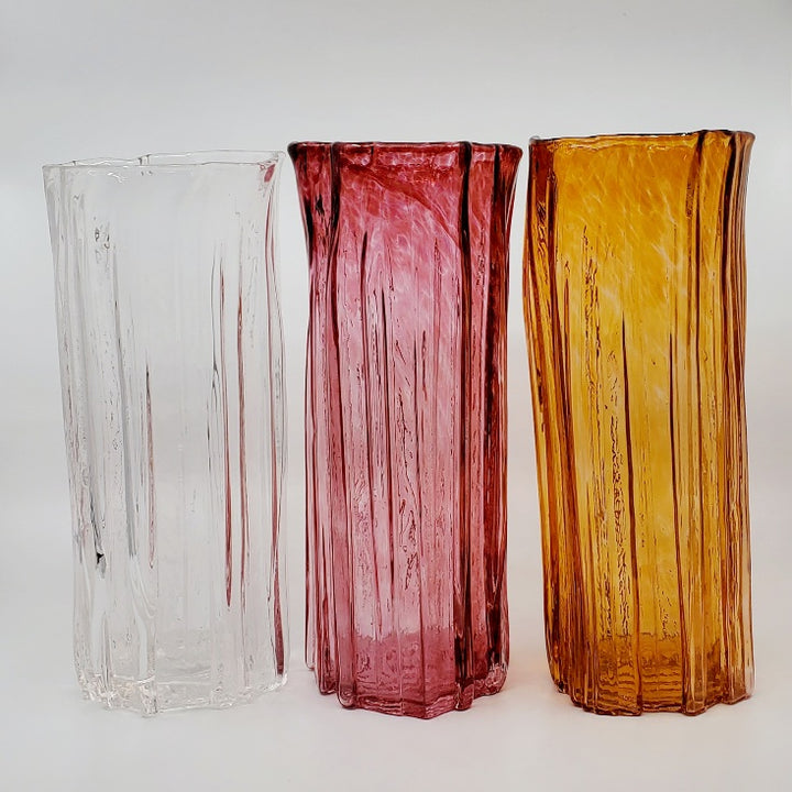 Xylem extra-large vases are available in a variety of rich and vibrant colours. These hand blown glass vessels will liven up home or office and make wonderful sets. - Clear, Pink, Salmon