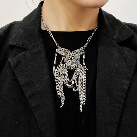 Stainless Steel Cuban Chain Necklaces are made of snake-like forms of salvaged chain. Each one is unique. 