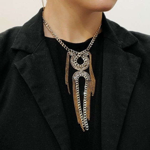 Stainless Steel Cuban Chain Necklaces are made of snake-like forms of salvaged chain. Each one is unique. 