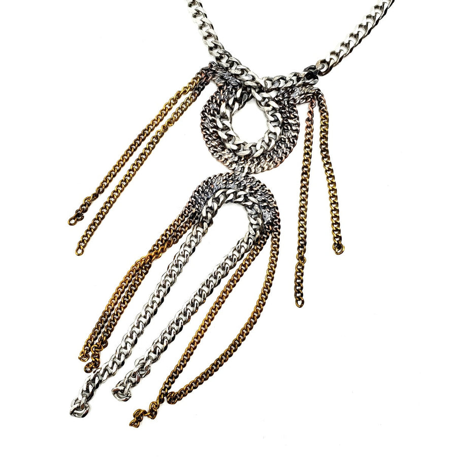 Stainless Steel Cuban Chain Necklaces are made of snake-like forms of salvaged chain. Each one is unique. 