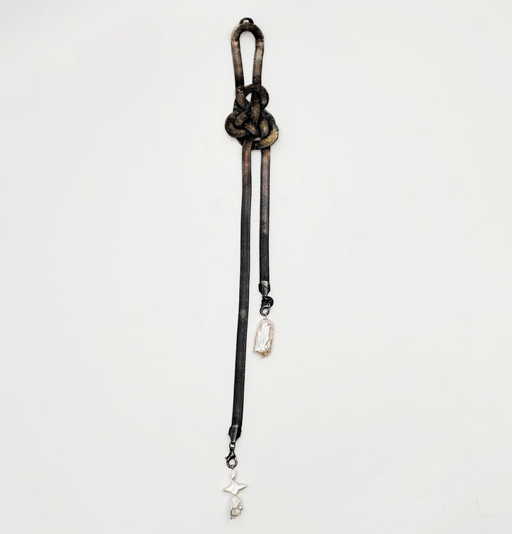 Silver snake chain brooch with baroque pearls. Repurposed, this snake-like silver-plated salvaged chain statement piece hangs 32cm long. 