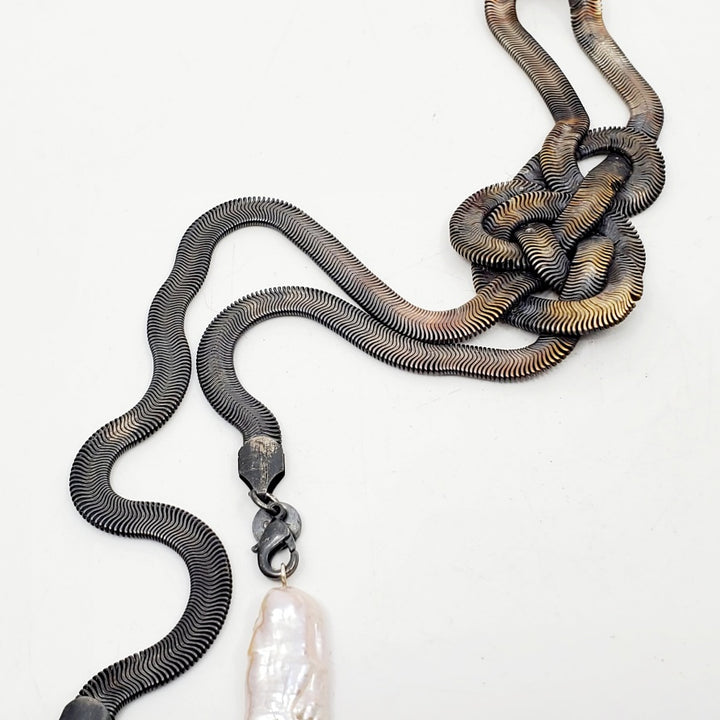 Silver snake chain brooch with baroque pearls. Repurposed, this snake-like silver-plated salvaged chain statement piece hangs 32cm long. 
