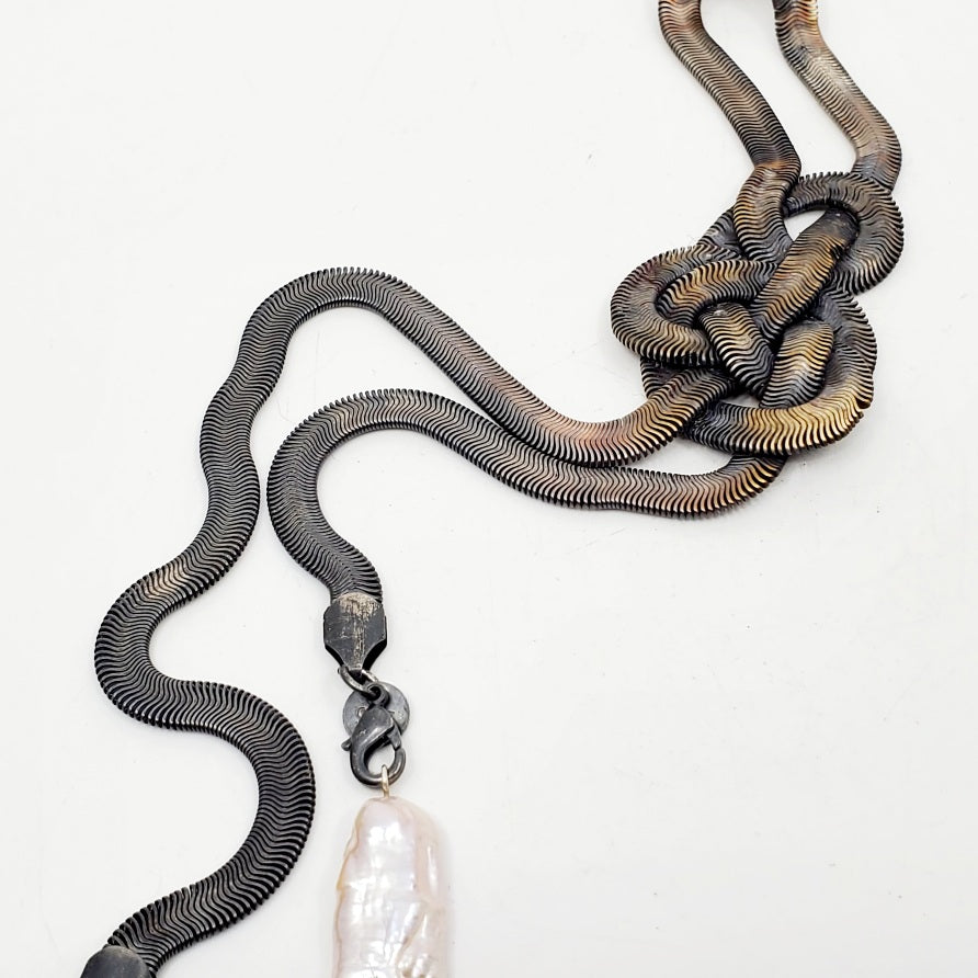 Silver snake chain brooch with baroque pearls. Repurposed, this snake-like silver-plated salvaged chain statement piece hangs 32cm long. 