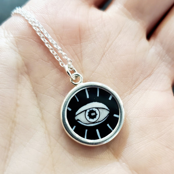 Evil eye: small murrine glass pendant on a 17" sterling silver chain.
