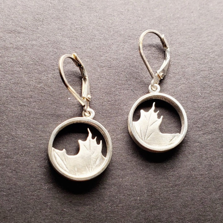 Maple leaf drop earring in sterling silver. 
