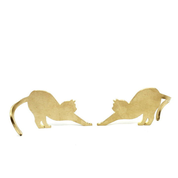 Brass cat stretching. Charming brass table object which can be posed facing to the left or to the right. Sold individually.