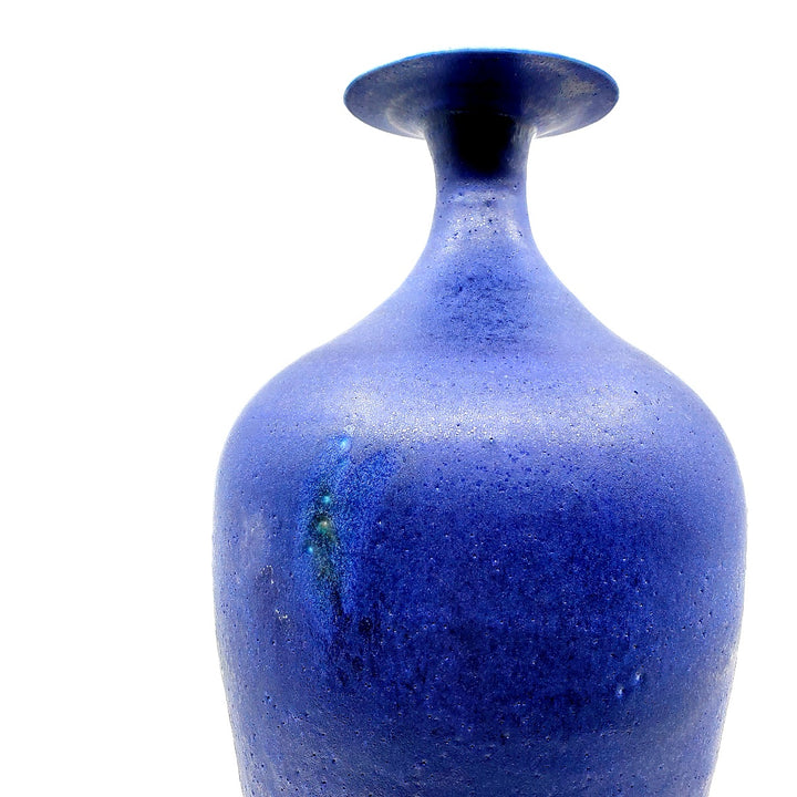 Tall cobalt blue vase.