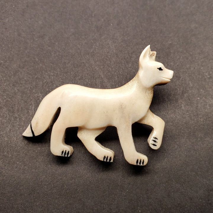 Fox brooch in caribou antler. 