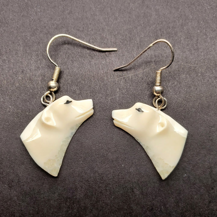 Polar bear drop earrings in walrus ivory.